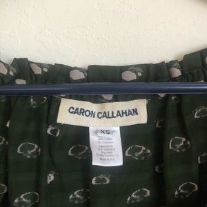 Beautiful dark green viscose and cotton holiday blouse.